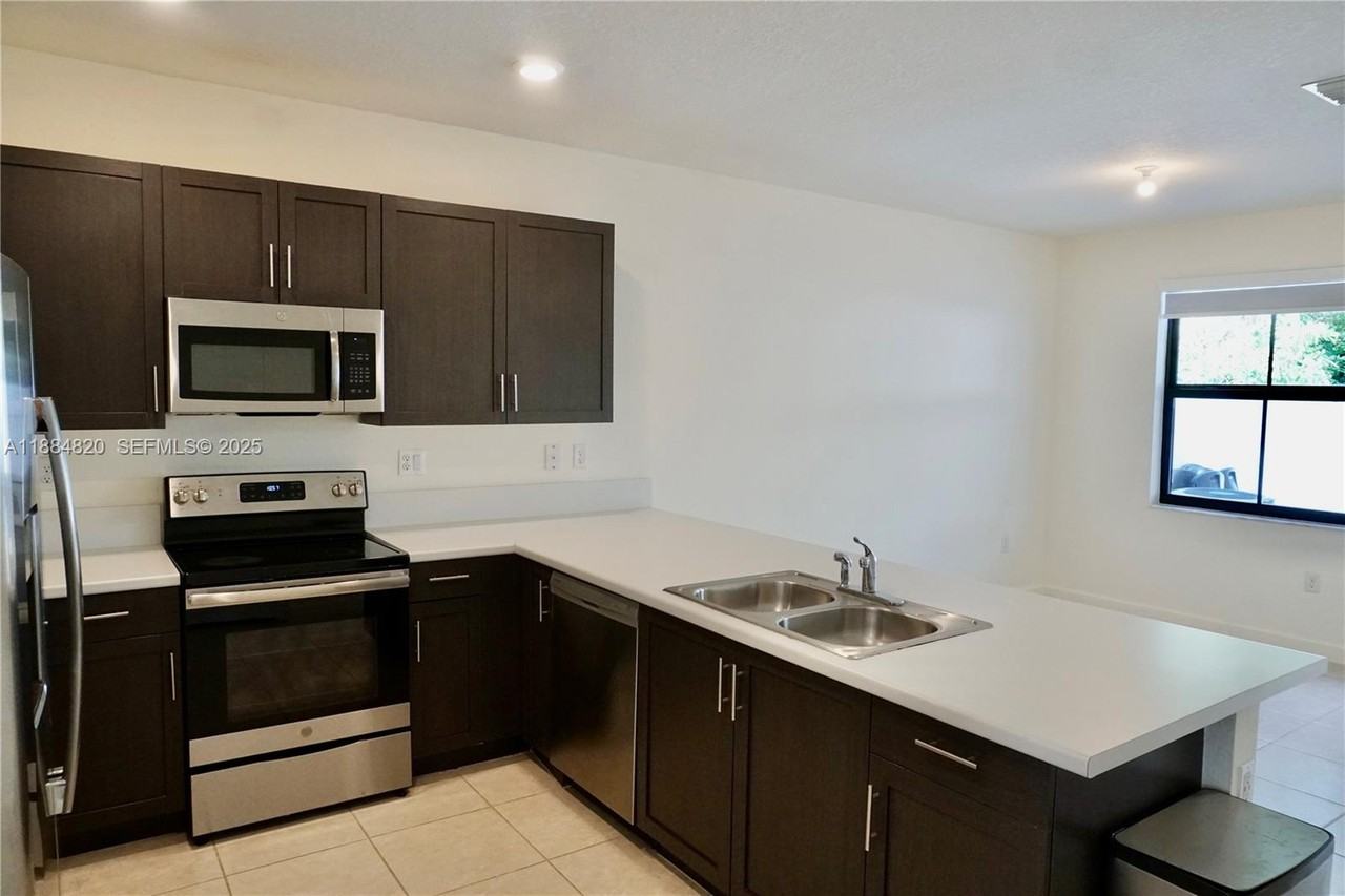 10606 West 33rd Court #10606 - Photo 2 of 52