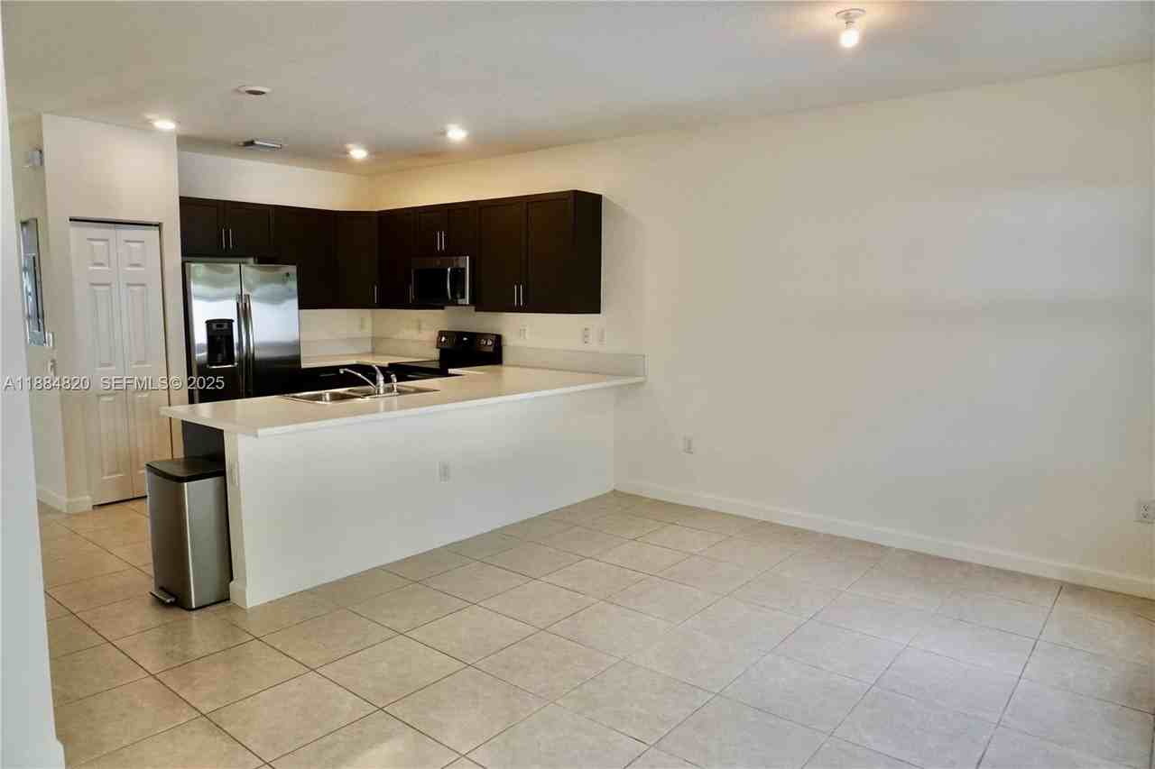 10606 West 33rd Court #10606 - Photo 5 of 52