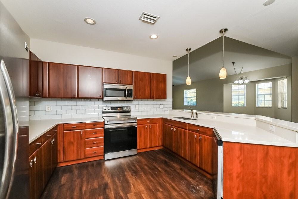 311 28th St W - Photo 7 of 16