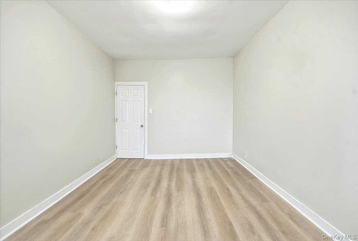 943 E 232nd St - Photo 4 of 13