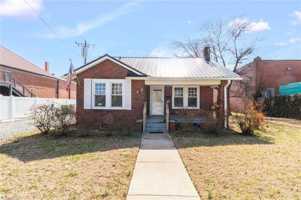 featured image of 205 W Hunter St