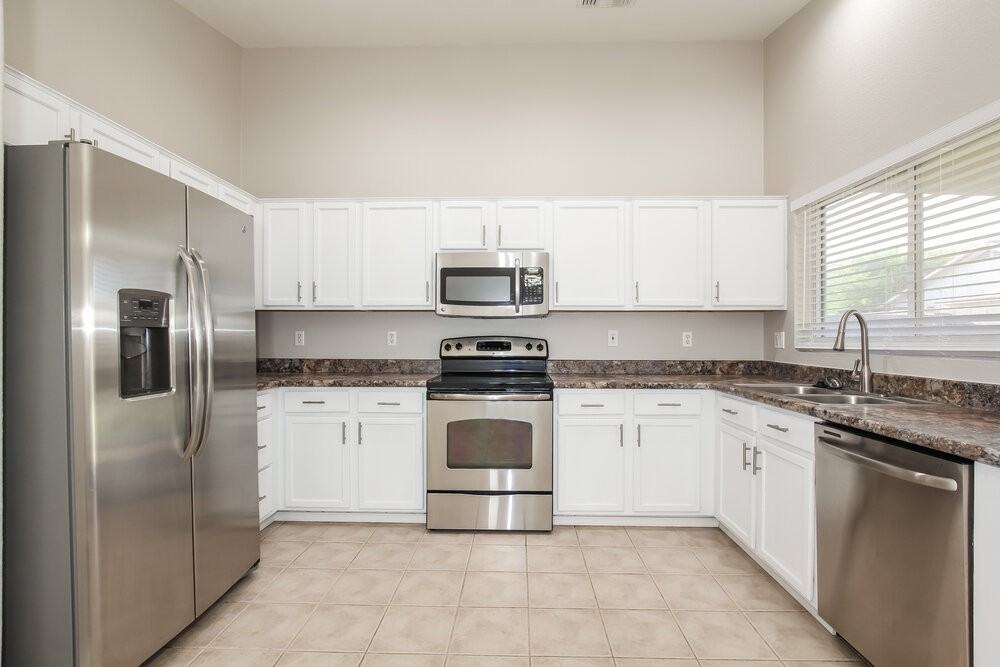 15434 W Gelding Dr - Photo 6 of 16