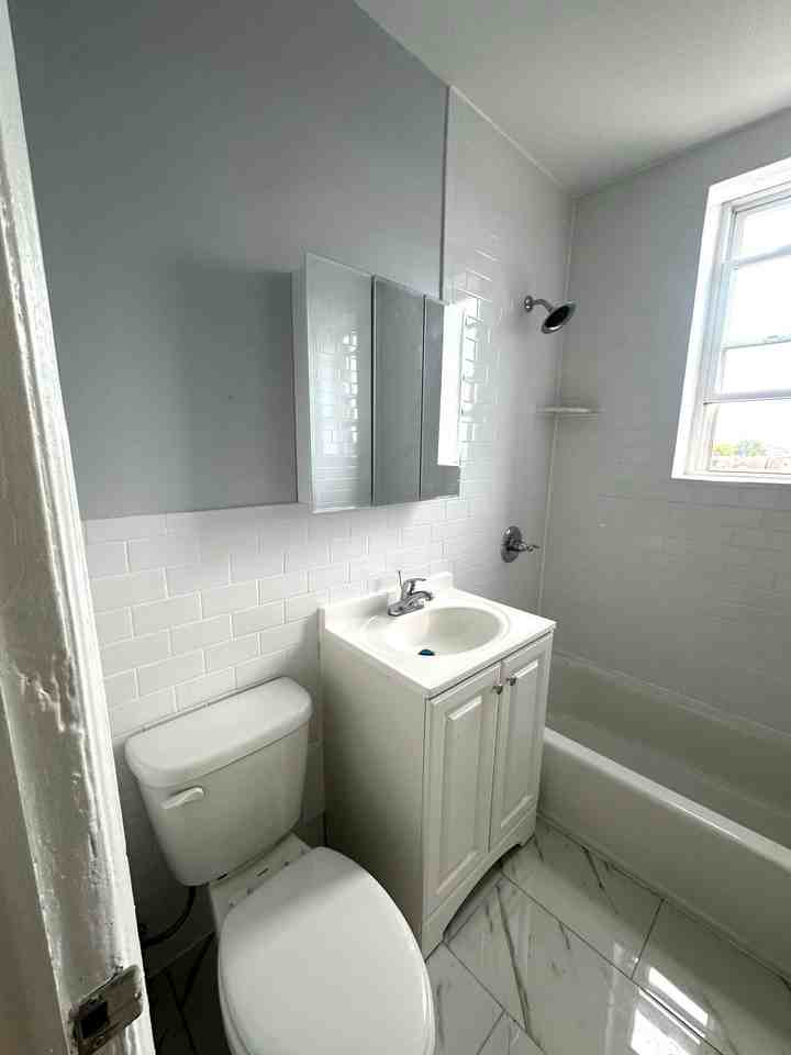 912 90th Street Apartments - Photo 2 of 5