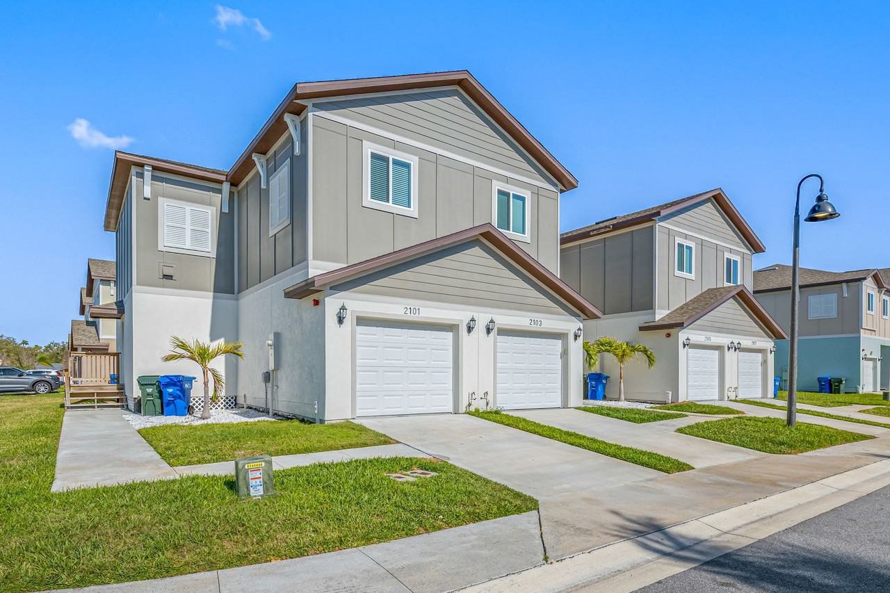 Whitney Place Townhomes - Photo 2 of 9