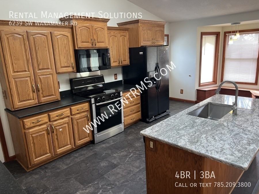 6239 Sw Wanamaker Rd - Photo 6 of 30