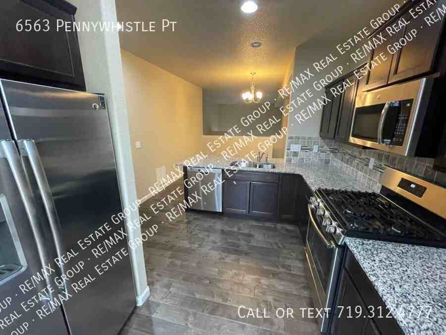 6563 Pennywhistle Pt - Photo 6 of 14