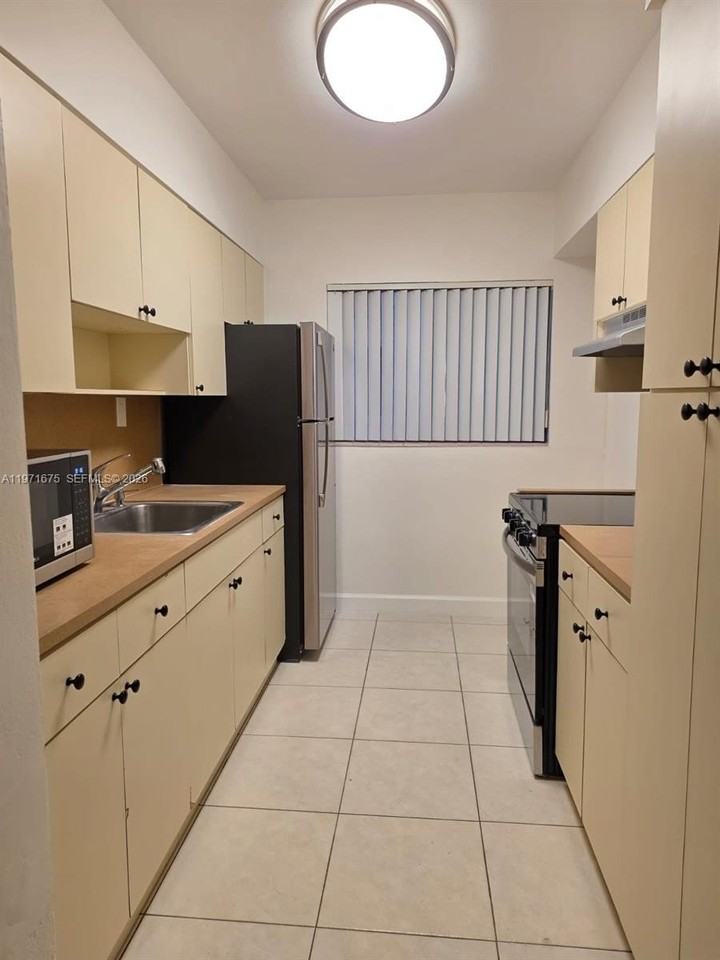 9490 E Bay Harbor Dr #102 - Photo 4 of 18