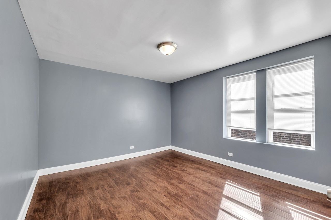 8241 S Maryland Ave Apt 3 - Photo 3 of 13