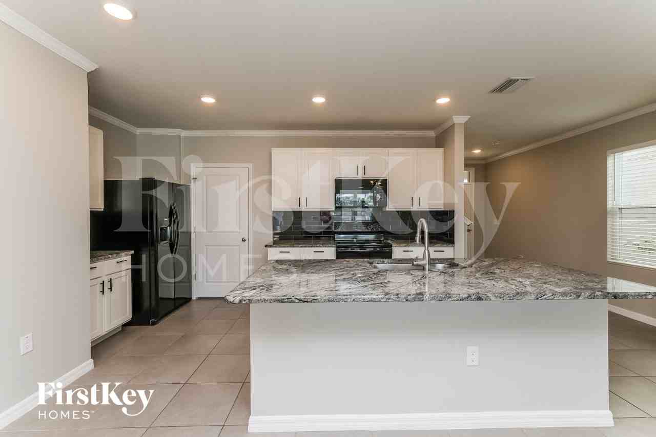 10303 Geese Trail Cir - Photo 3 of 15