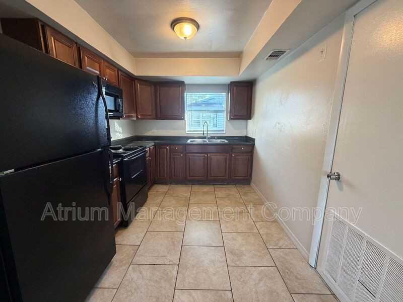7106 S Kissimmee St #D - Photo 7 of 28