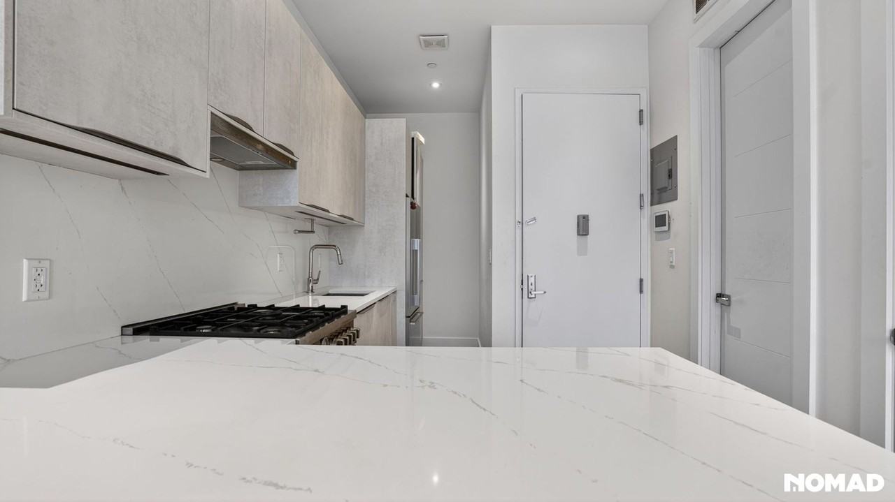 1129 Halsey St - Photo 5 of 12