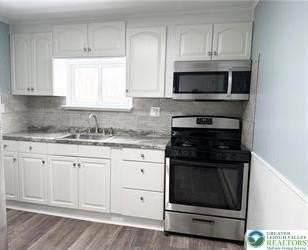 415 E 5th St - Photo 5 of 15