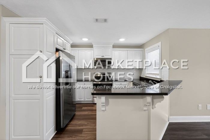 2235 Perrins Ln - Photo 6 of 24