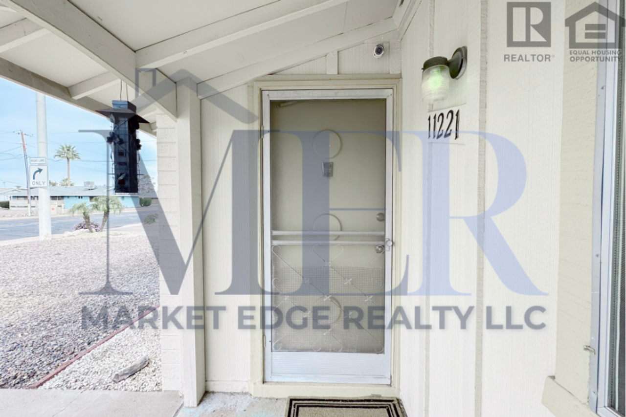 11221 N 103rd Ave - Photo 7 of 47