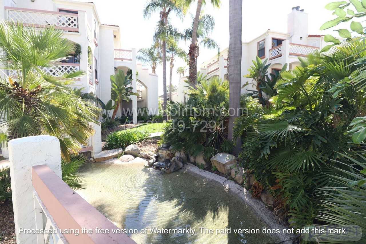 9356 Twin Trails Dr #103 - Photo 2 of 18