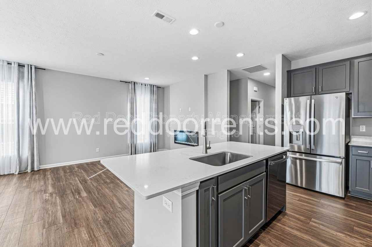 10704 Maidenhair Dr - Photo 5 of 29