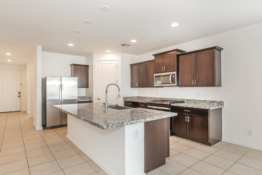 11014 W Luxton Ln - Photo 5 of 16