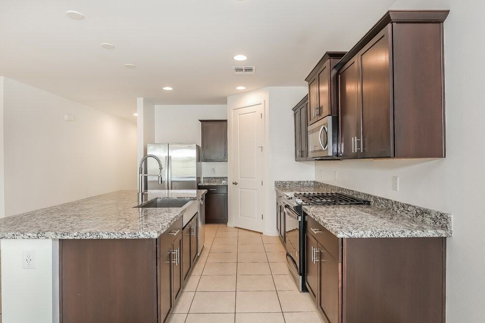 11014 W Luxton Ln - Photo 6 of 16