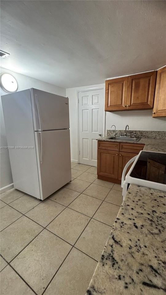 5158 Nw 23rd Ave #0 - Photo 5 of 19