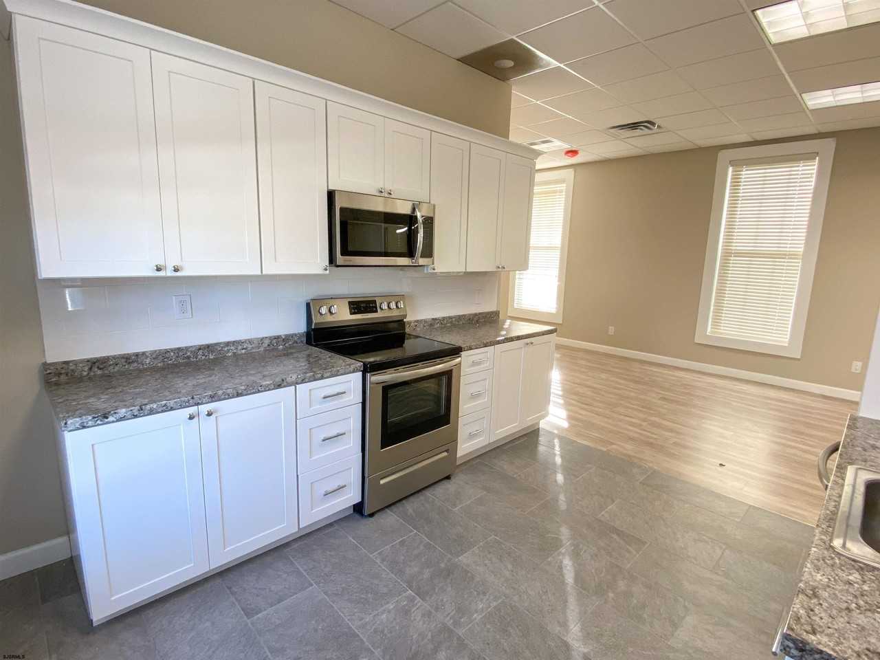 6019 Main St - Photo 4 of 26