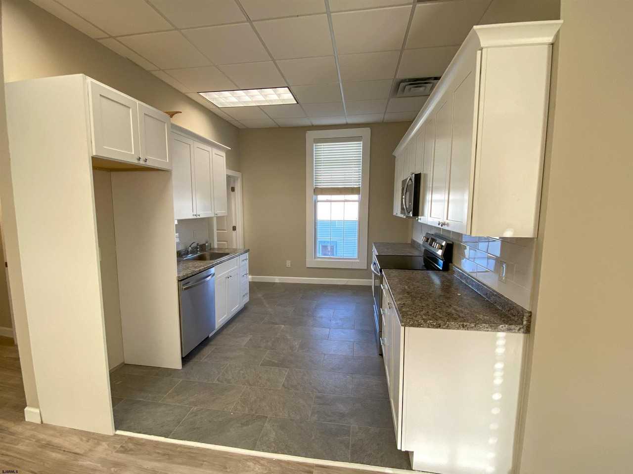 6019 Main St - Photo 7 of 26