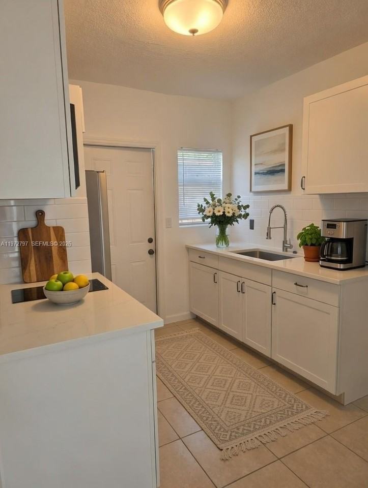 632 Nw 14th Ter #1 - Photo 2 of 9