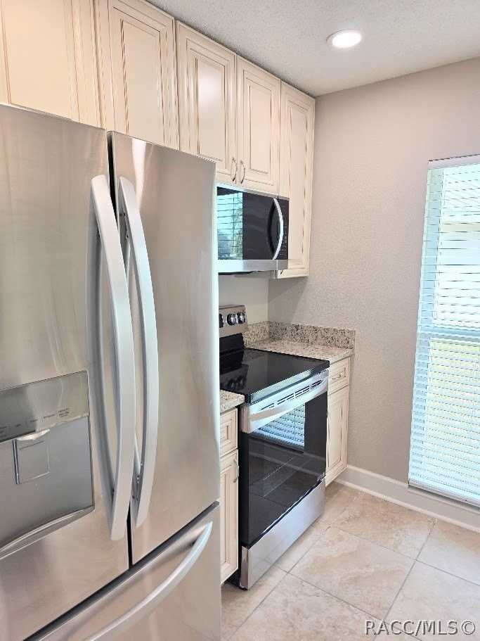 11612 W Kingfisher Ct - Photo 5 of 35