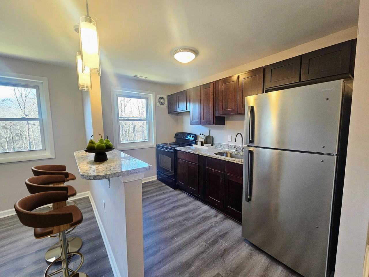 Wildwood Gardens Apartments - Photo 2 of 7