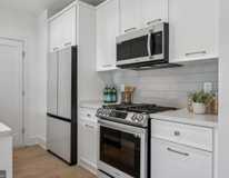 Ruddy Management – 113 Varnum St NW Apartments - Photo 1 of 1