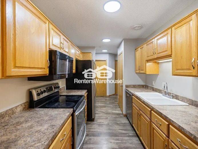 5604 100th Ln N - Photo 5 of 16