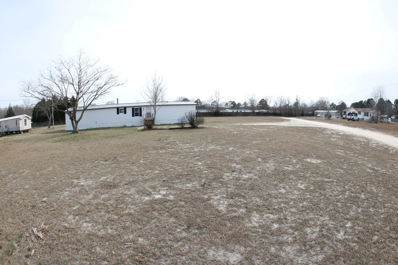 7025 Ottis Ln - Photo 3 of 24