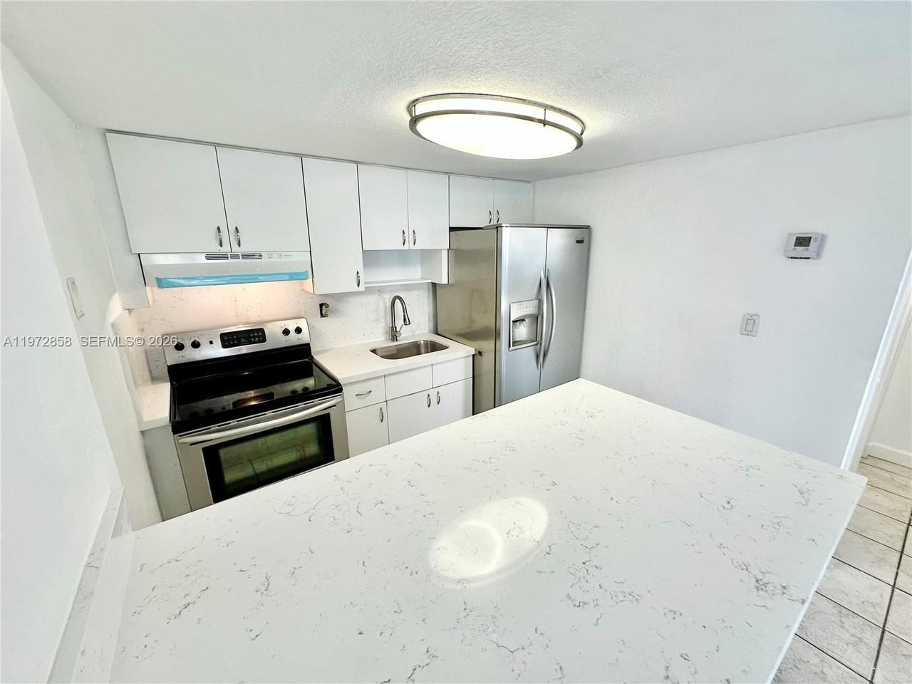 4275 Nw South Tamiami Canal Dr #2-104 - Photo 4 of 34