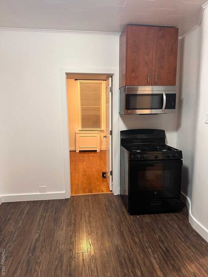 6034 56th Rd Unit 2r - Photo 2 of 10