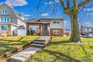 featured image of 10317 Farmers Blvd 1st Fl