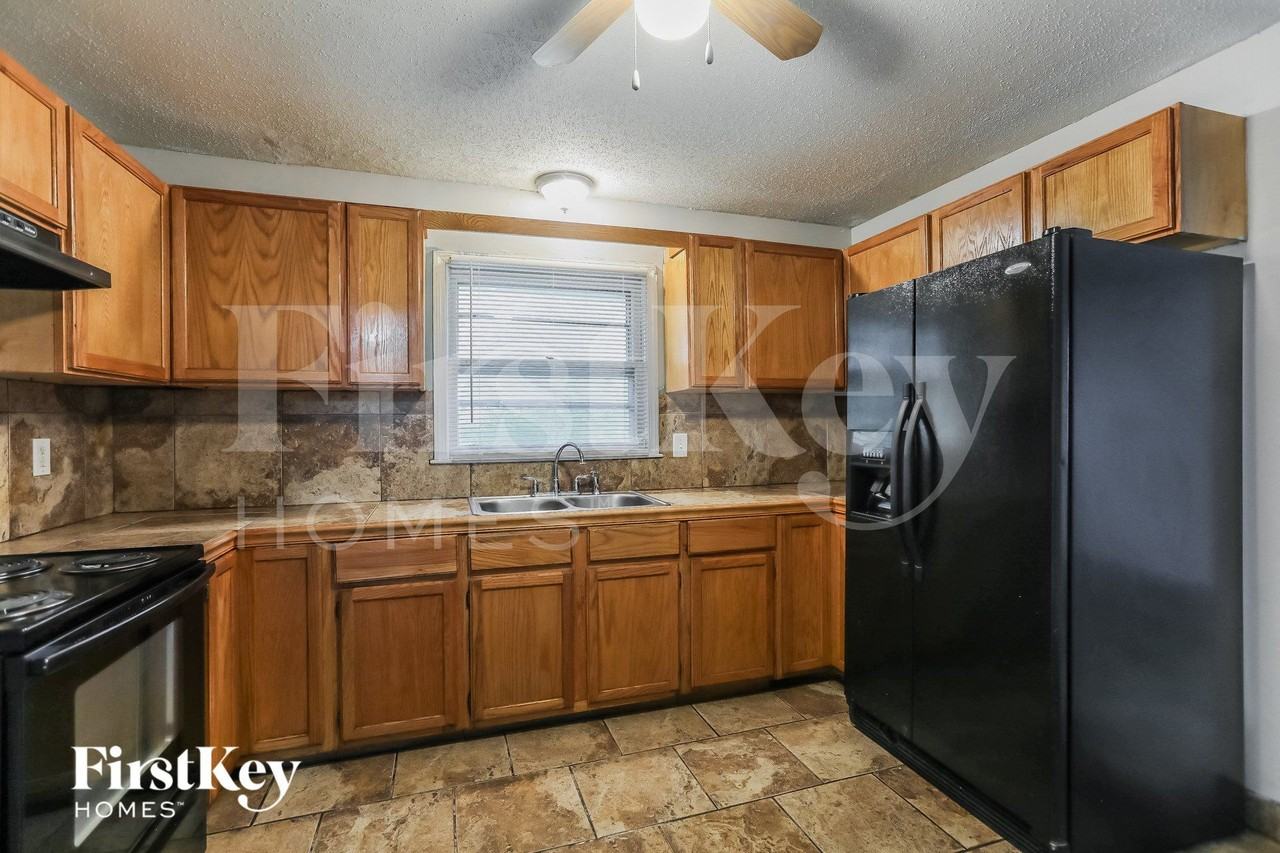 8313 E 85th Ter - Photo 6 of 15