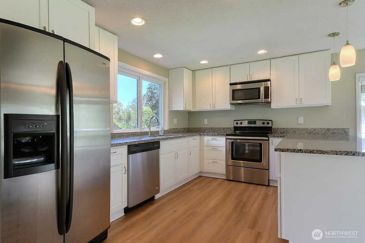 4702 66th Ave Nw - Photo 5 of 12