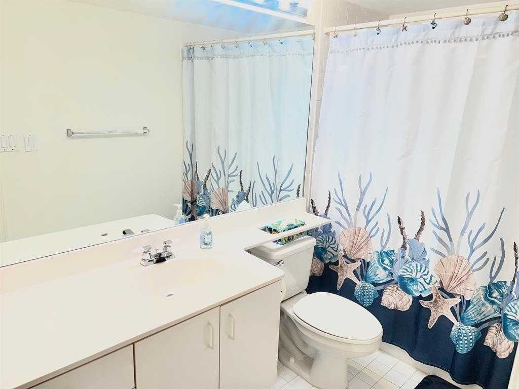 7831 Granville Dr #203 - Photo 5 of 9