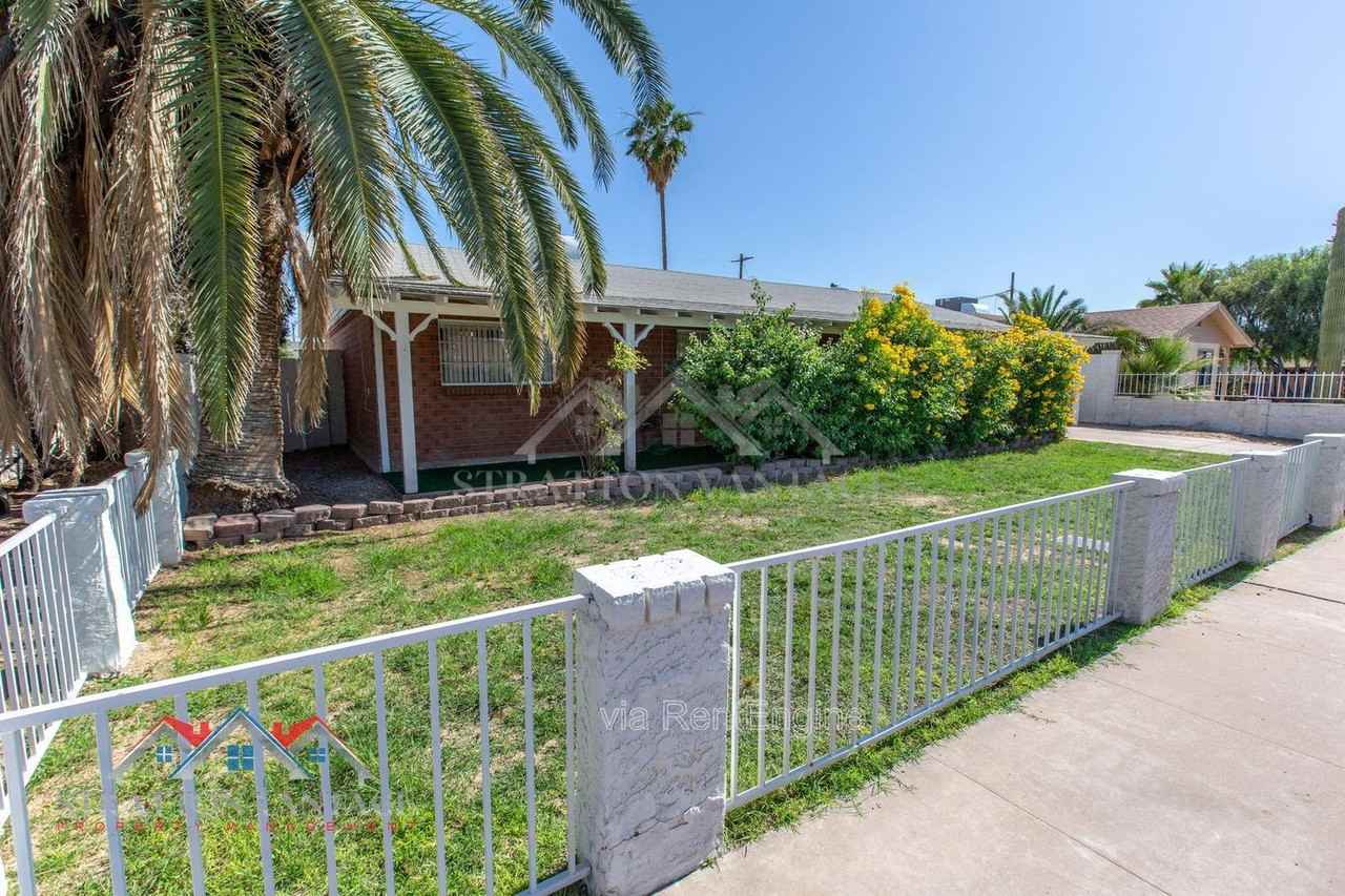 8119 E Amelia Ave - Photo 2 of 50