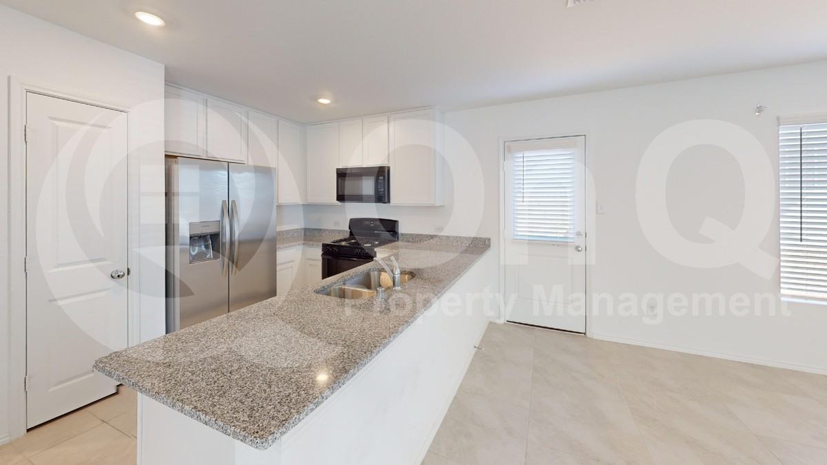 2916 Tibbles Dr - Photo 5 of 23