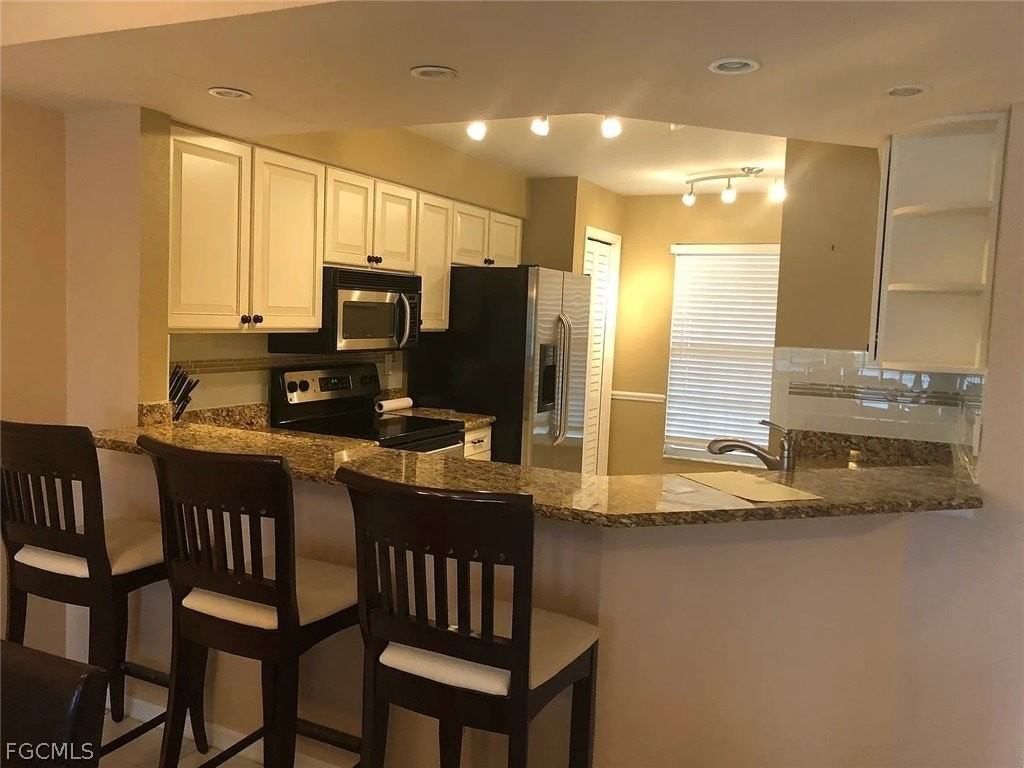 9580 Victoria Ln Unit A102 - Photo 2 of 13