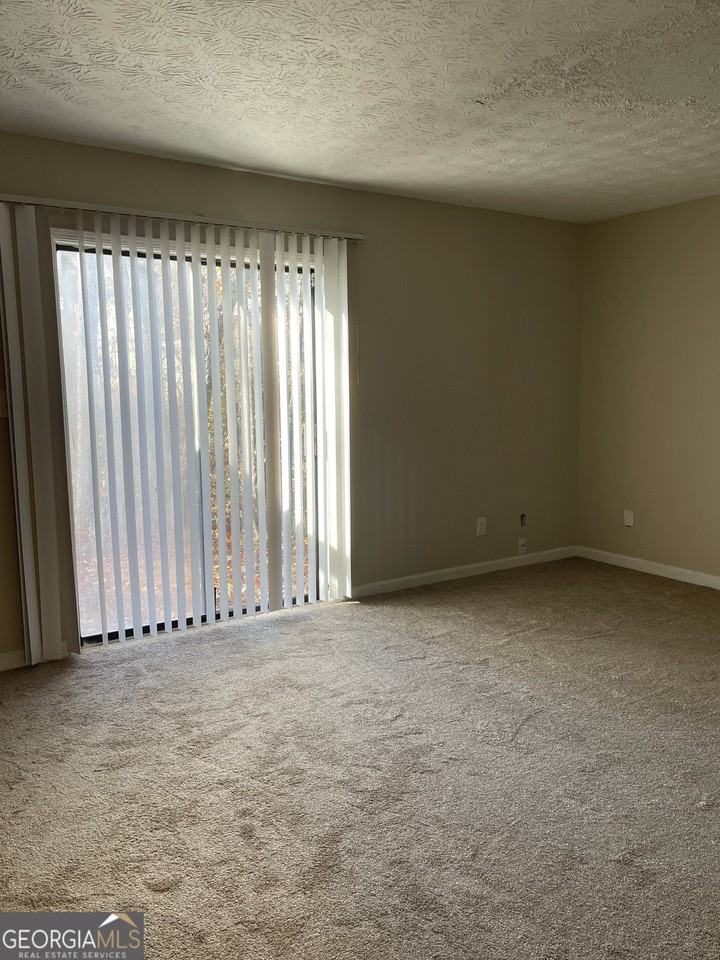 5763 N Castlegate Dr Apt A - Photo 3 of 12