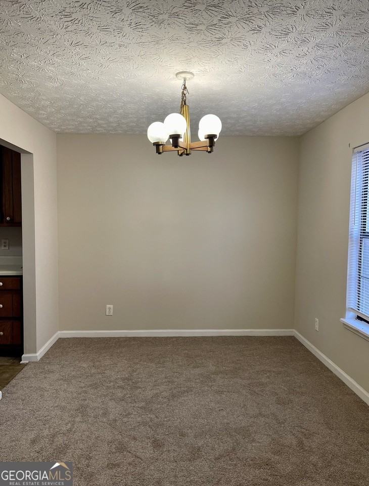 5763 N Castlegate Dr Apt A - Photo 4 of 12