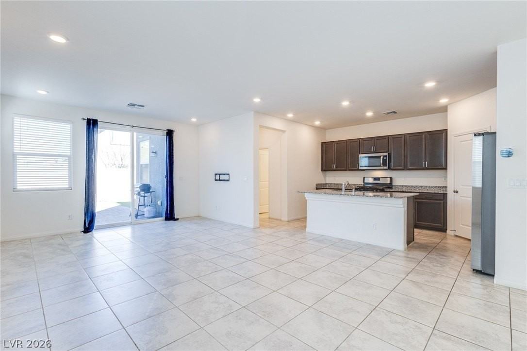 9858 W Meranto Ave - Photo 6 of 34