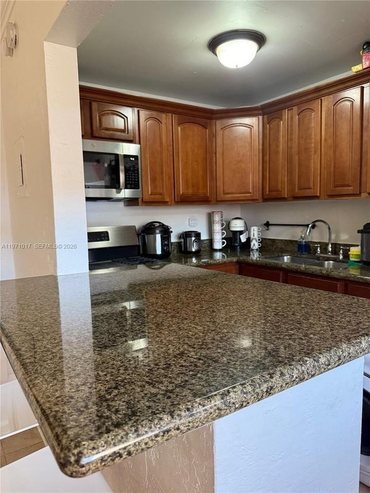 1230 W 54th St #211A - Photo 2 of 12