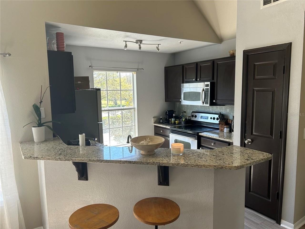 8925 Lee Vista Blvd #2704 - Photo 7 of 11