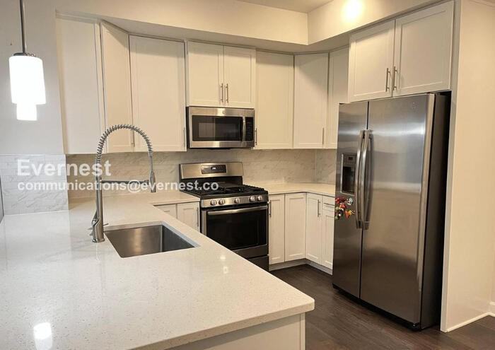 13230 Woodland Park Rd #1J - Photo 4 of 18