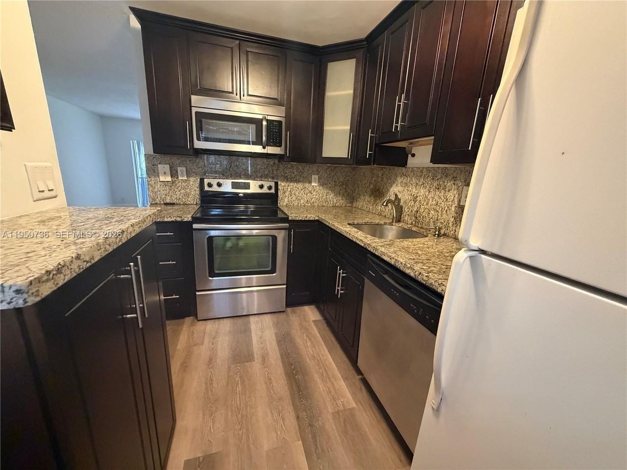 300 Gardens Dr #104 - Photo 6 of 22