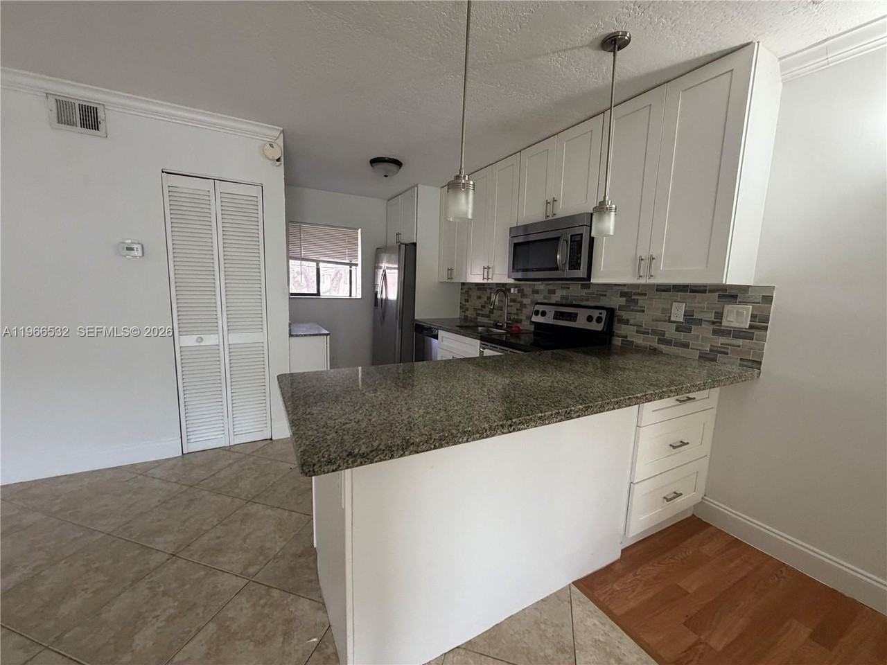 104 Gardens Dr #203 - Photo 3 of 24