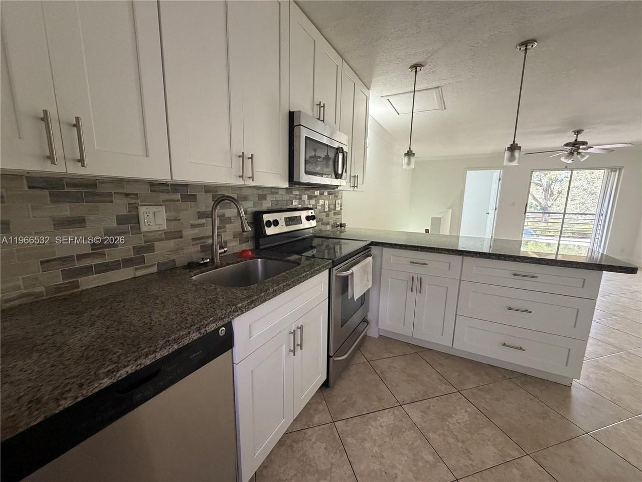 104 Gardens Dr #203 - Photo 4 of 24