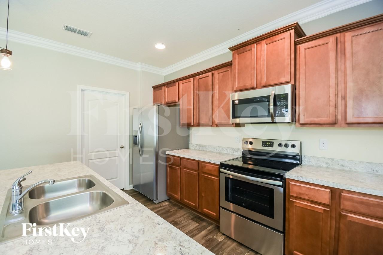 6944 Sandle Dr - Photo 5 of 15